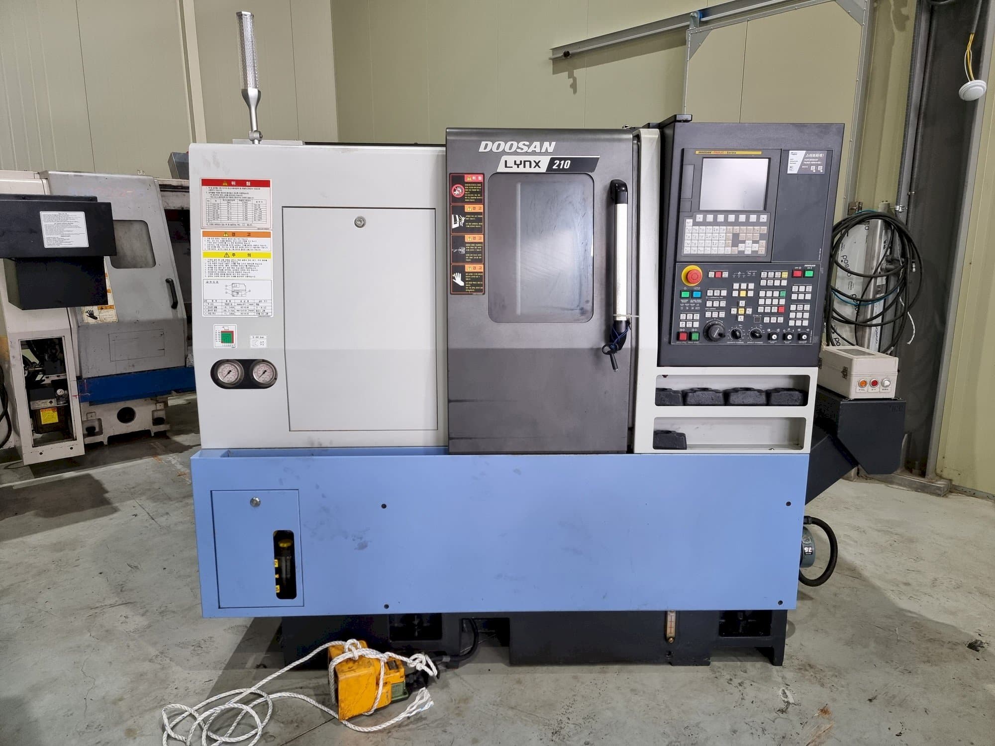 Front view of Doosan LYNX 210  machine