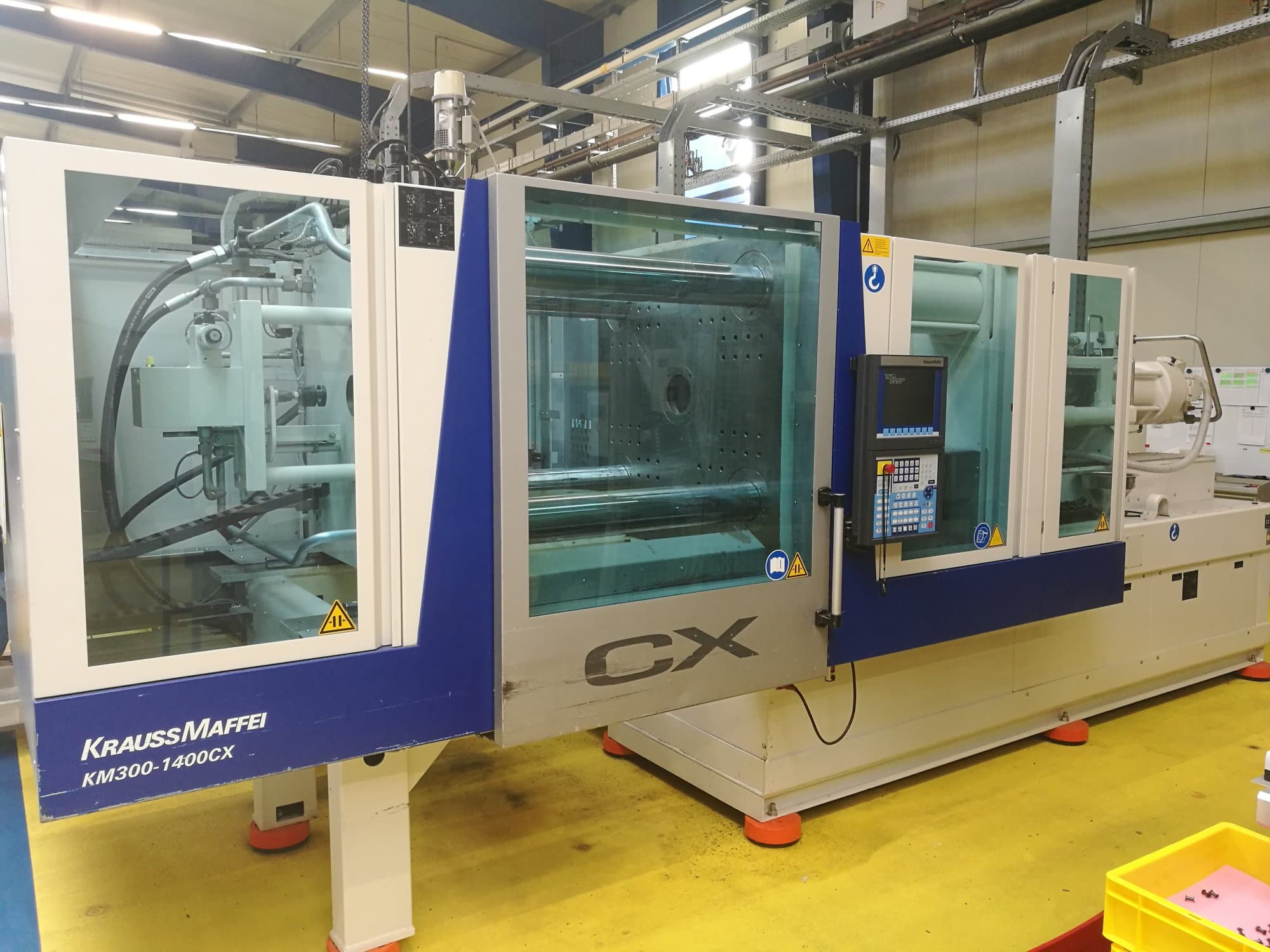 Front view of Krauss Maffei 300-1400 CX Machine