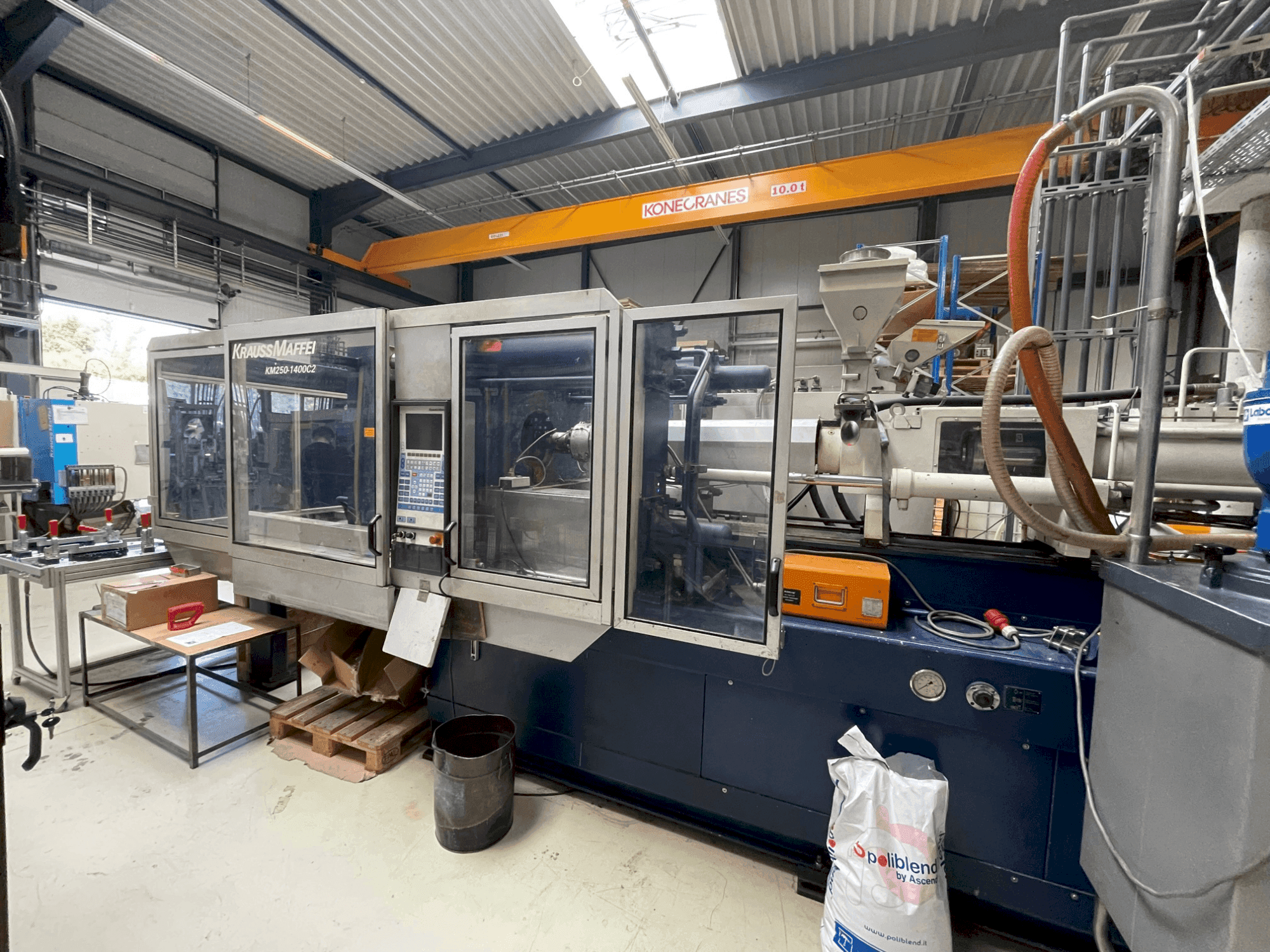 Front view of Krauss Maffei 250-1400 C2  machine