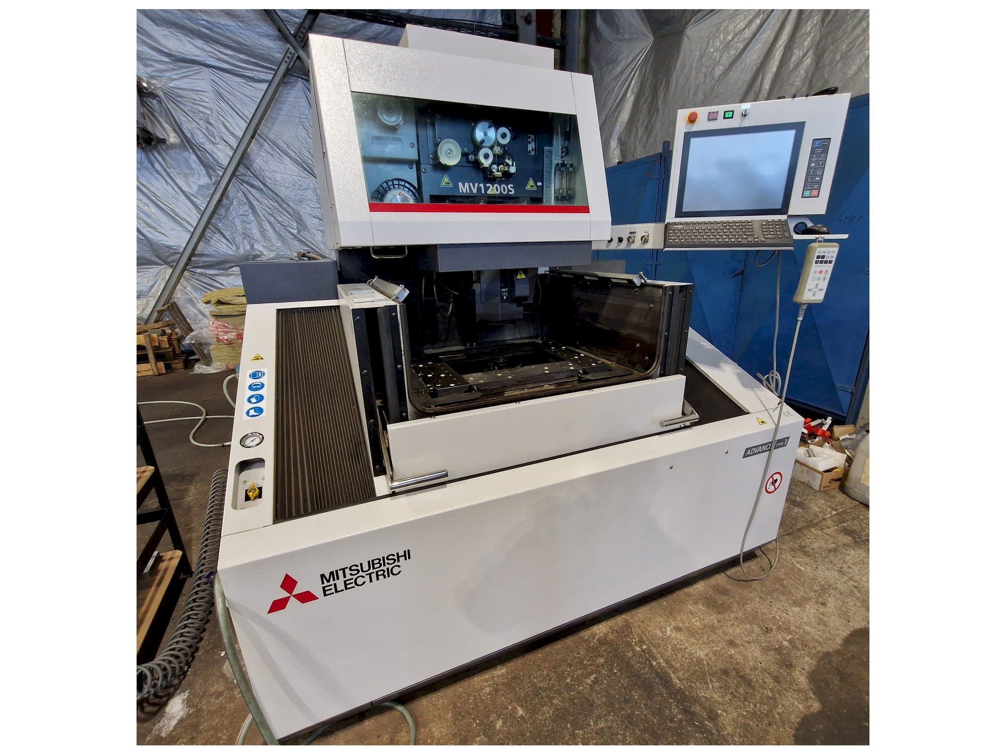 Front view of Mitsubishi MV1200S  machine