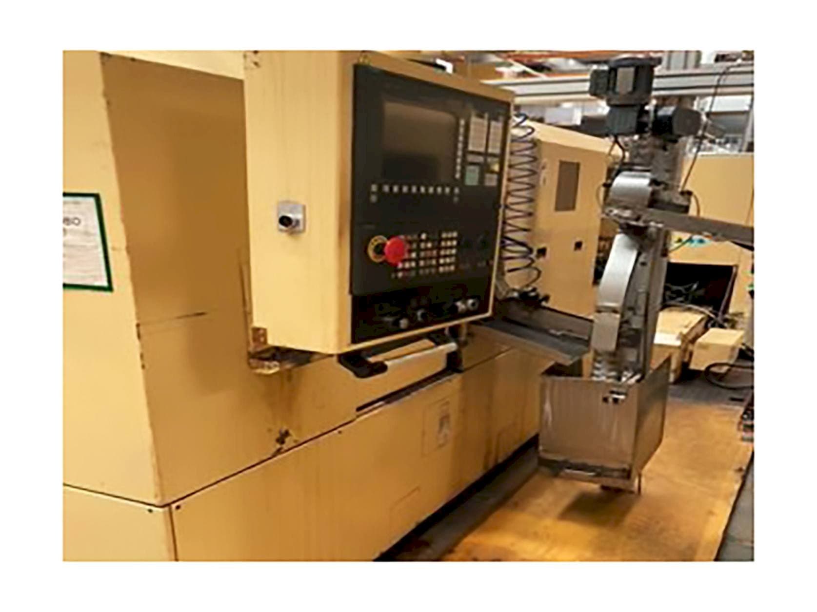 Left side view of TAJMAC-ZPS SAL 100/4  machine