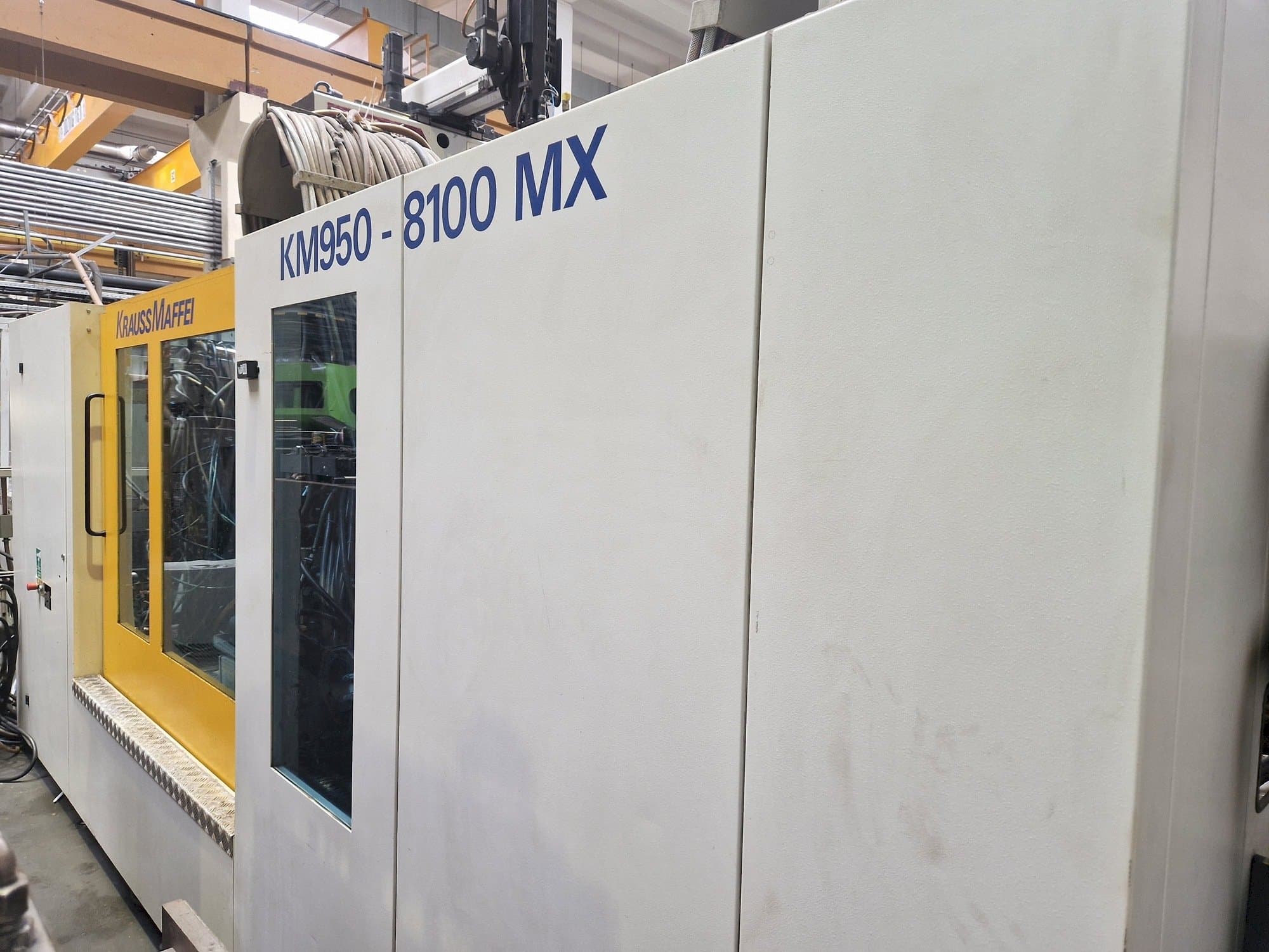 Front view of Krauss Maffei 950-8100 MX  machine