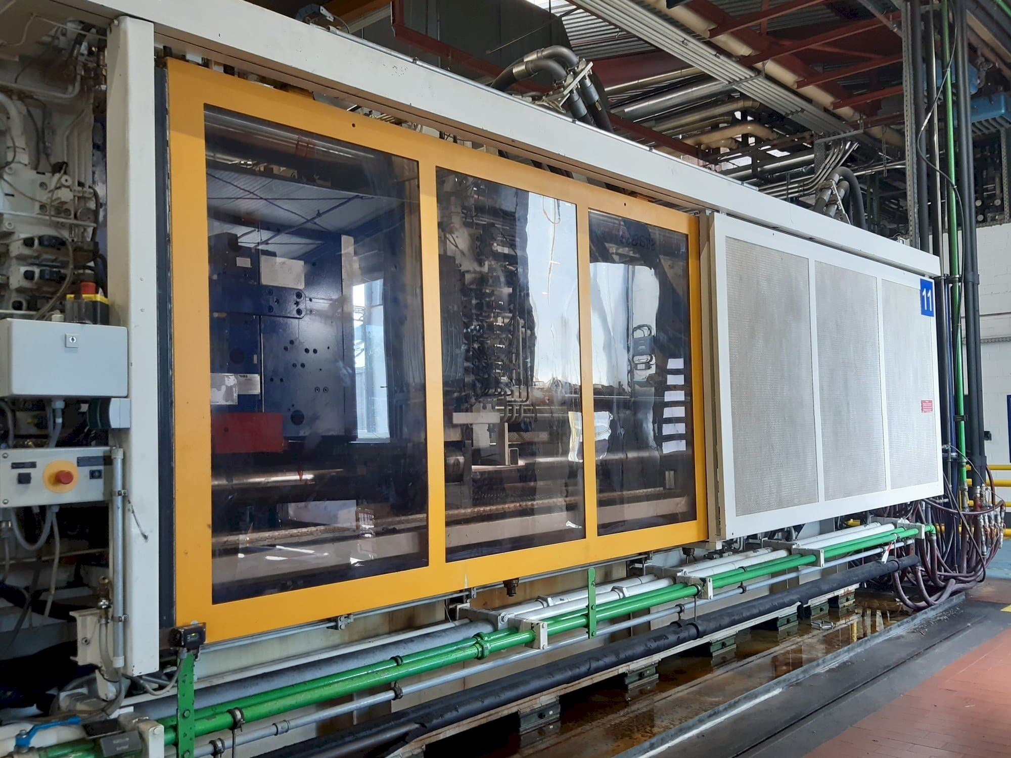 Front view of Krauss Maffei 1300-8000 M  machine