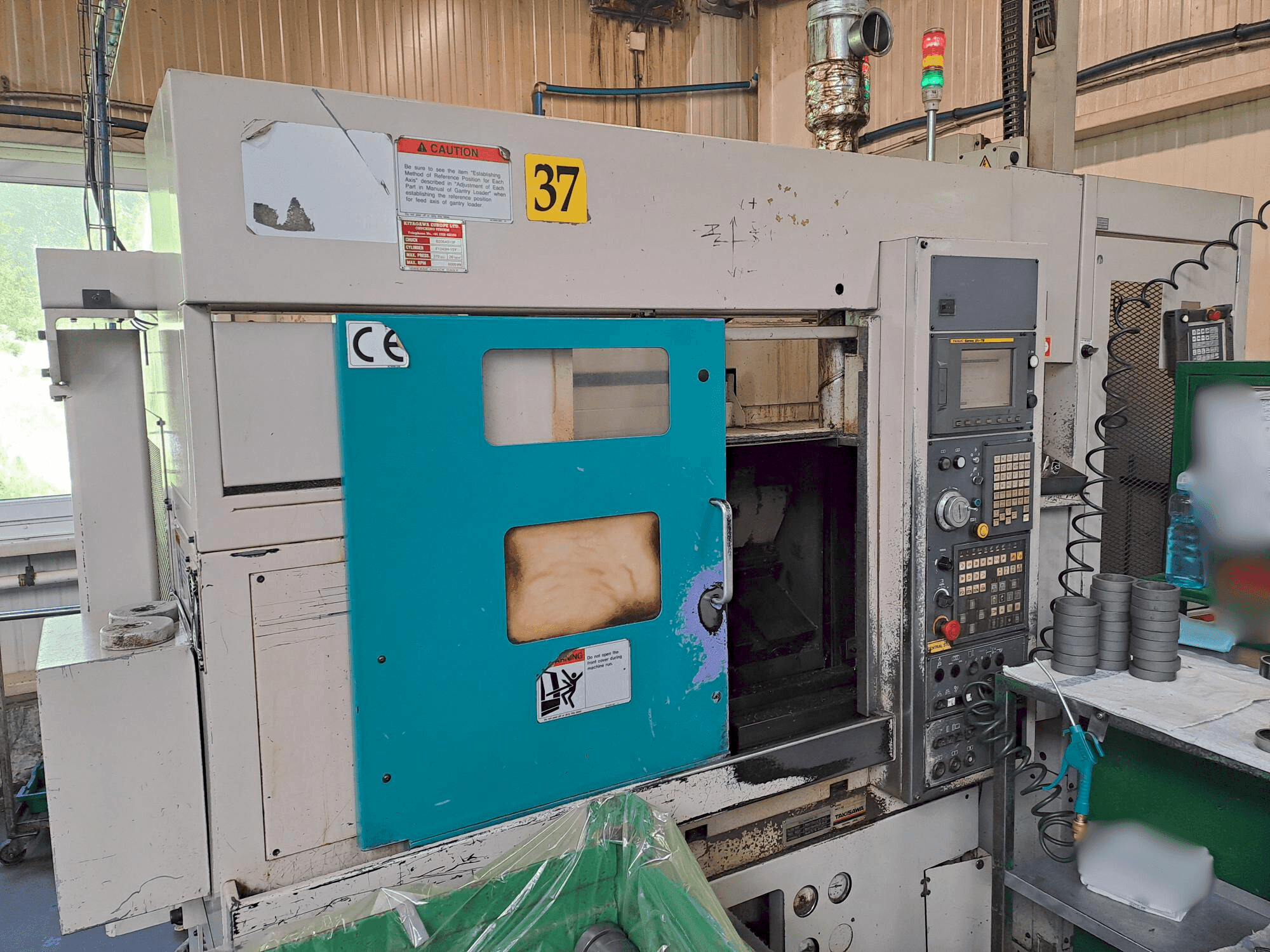 Front view of Takisawa TC 200  machine