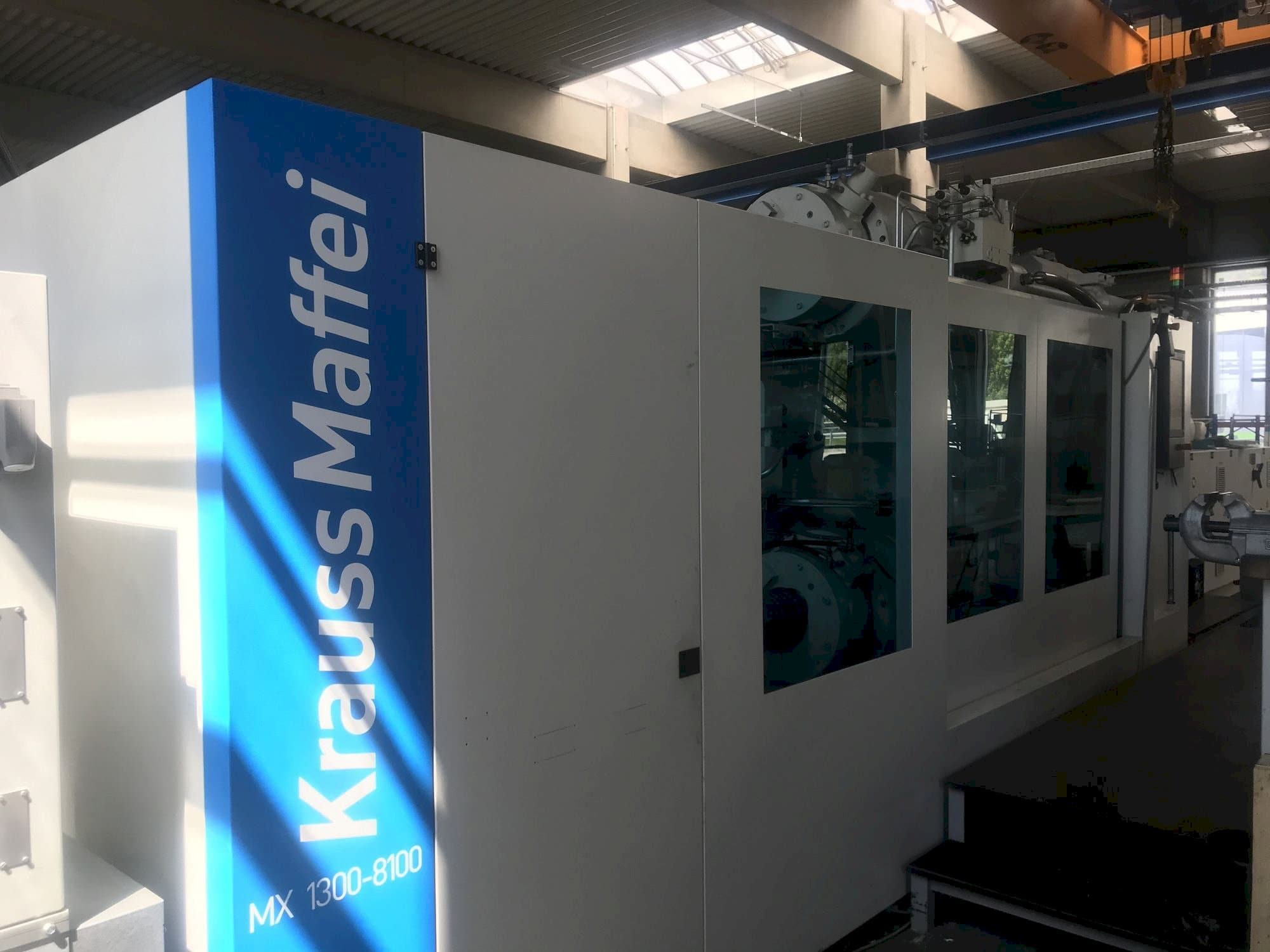 Front view of Krauss Maffei 1300-8100 MX  machine
