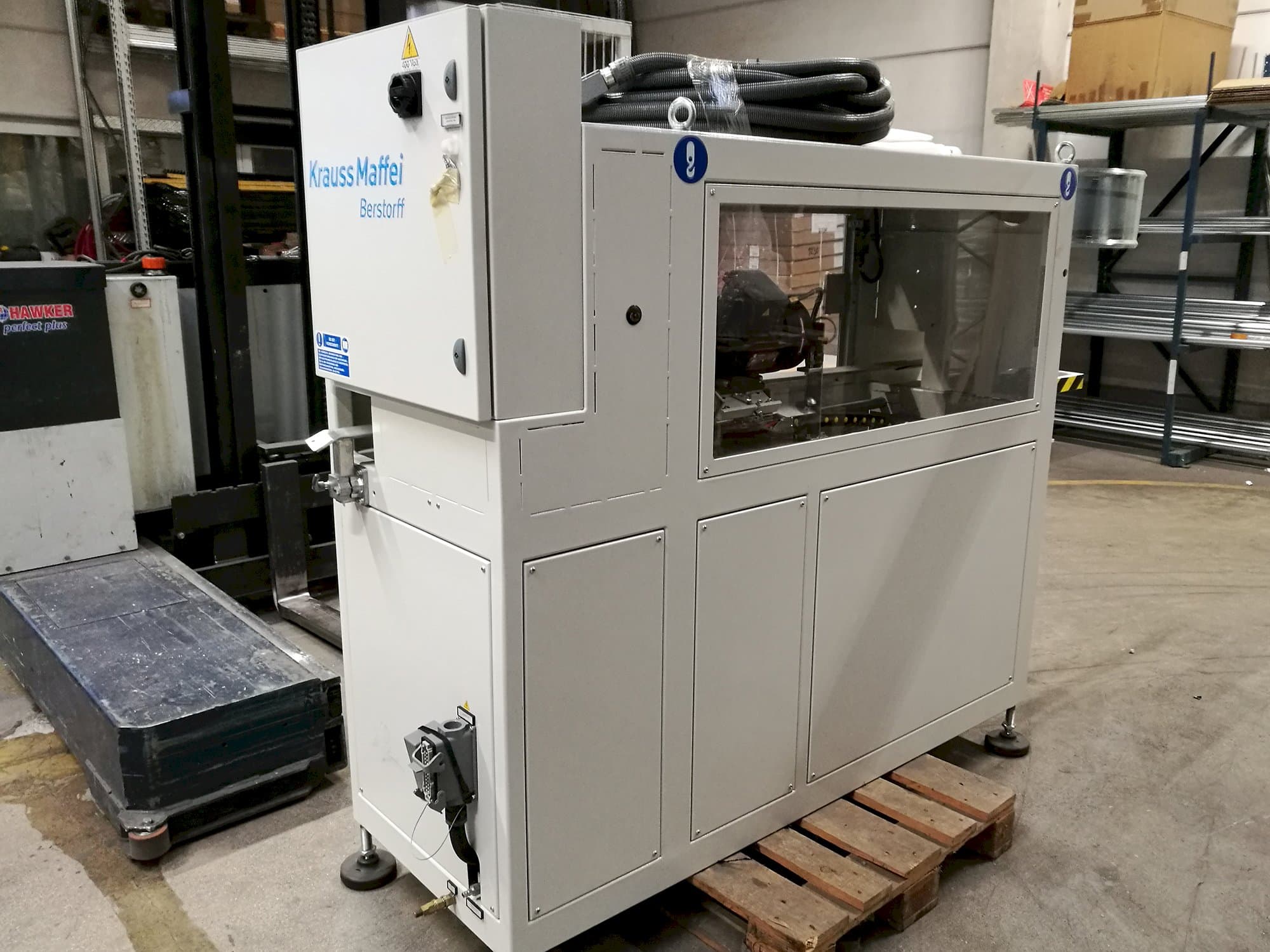 Left view of Krauss Maffei TL 63 Machine