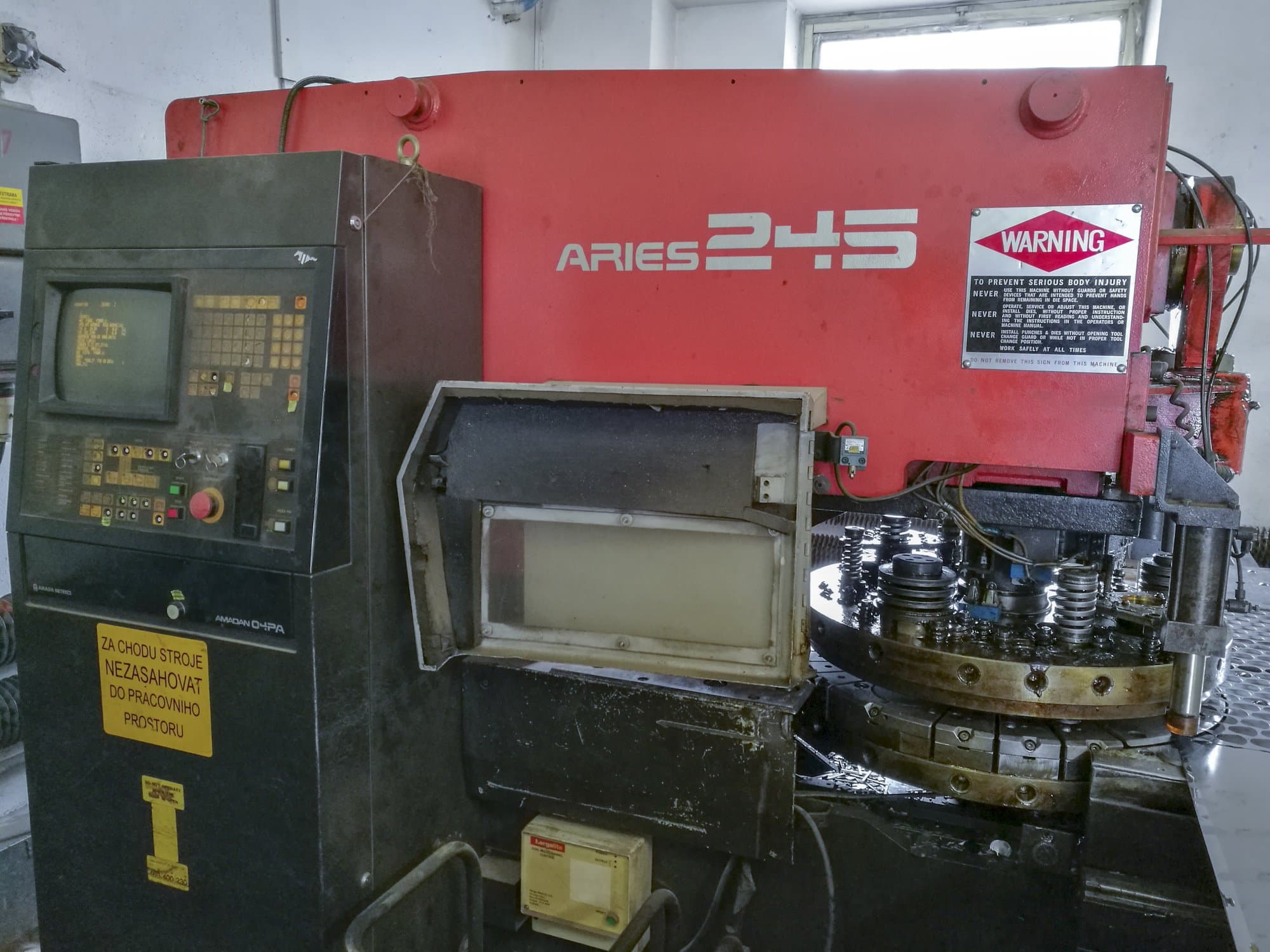 Front view of AMADA ARIES 245 machine