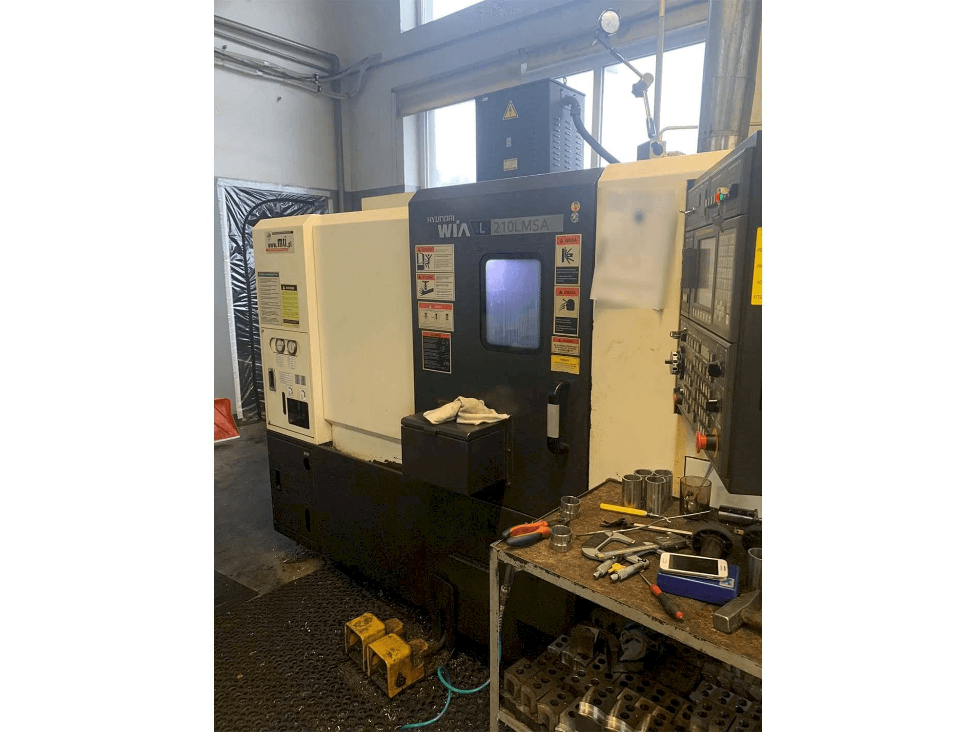 Front view of Hyundai Wia L210LMSA machine