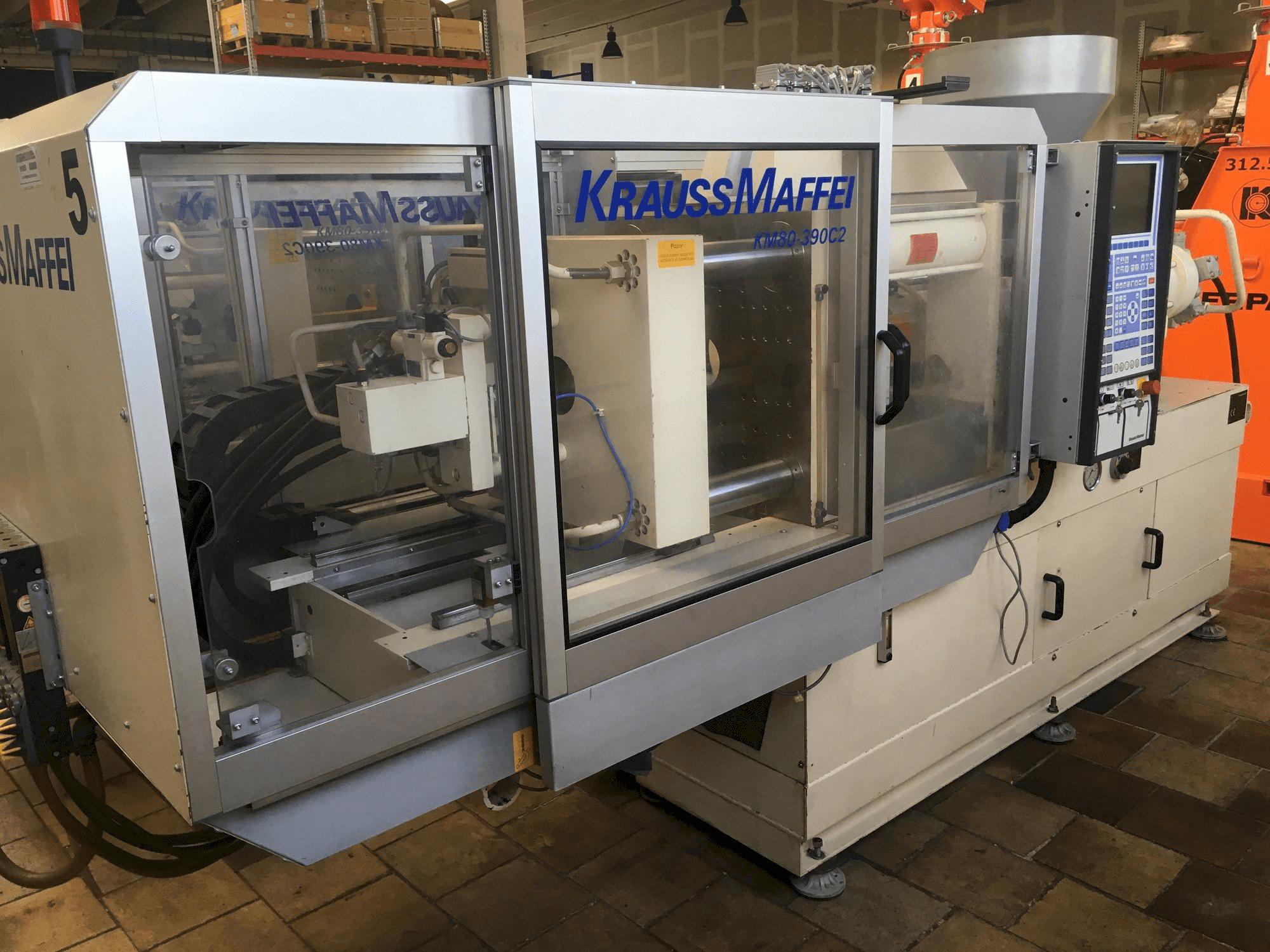 Front view of Krauss Maffei 80/390 C2 machine