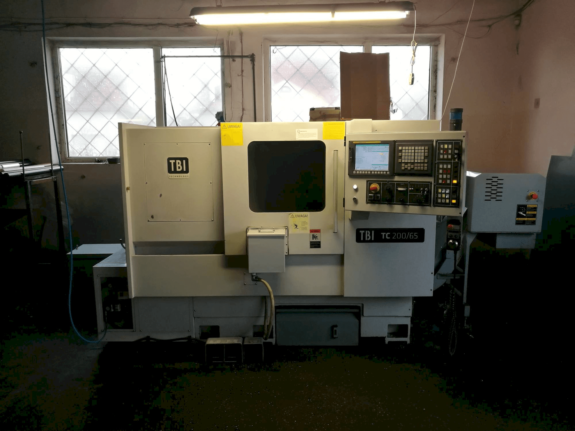 Front view of TBI TC 200-65MC machine